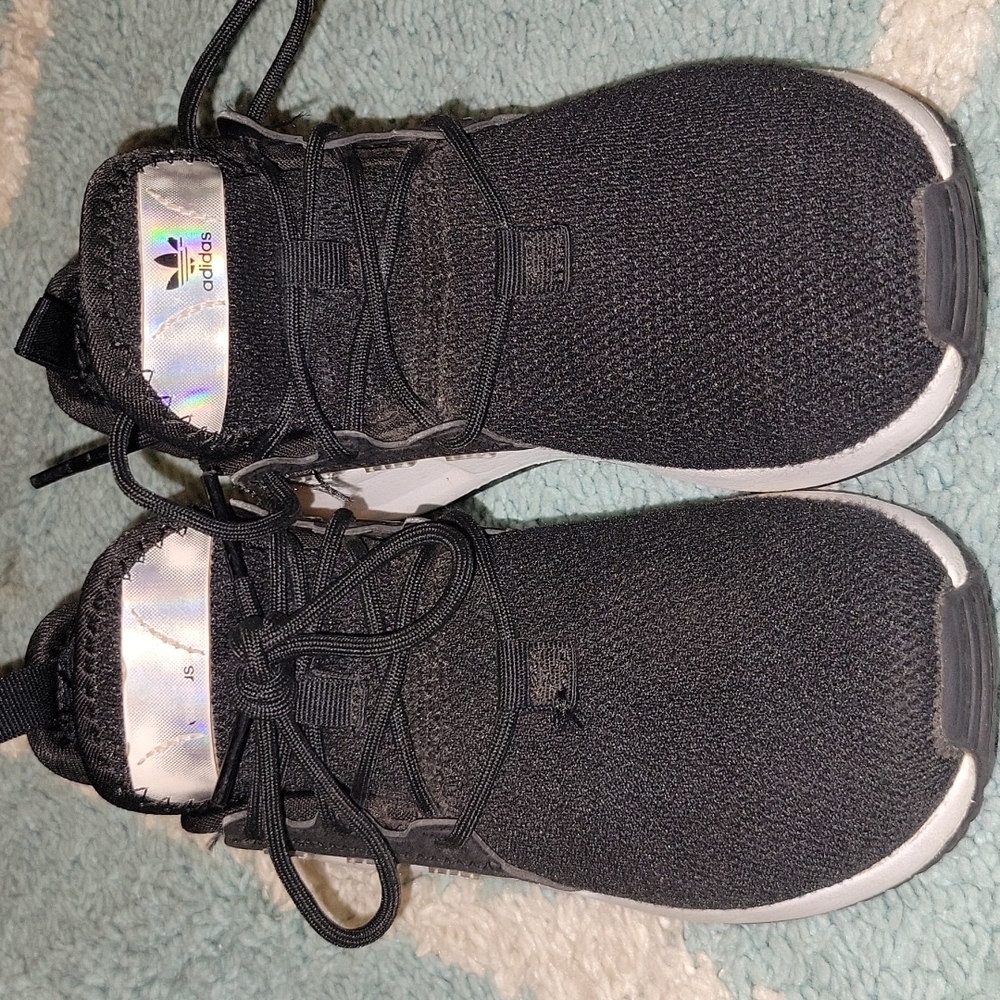 Girls black and silver Adidas size 11.